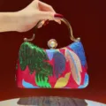 Elegant sequin embroidered evening clutch bag with pearl clasp and metal handle for women. - Red