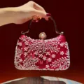 Elegant red satin evening clutch bag with white pearls beads and gold metal handle. - Red