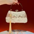 Chic Chinese style evening clutch bag featuring lace flowers, pearl beads and gold tassel. - Gold