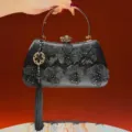 Elegant black evening bag with floral lace bead embroidery, metal handle and tassel pendant. - Black
