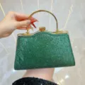 Groene glitter avondtas handtas met gouden metalen handvat en sprankelende strass. - Groen