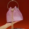 Pink glitter bucket bag with gold round handle and chain tassel, elegant evening handbag. - Pink