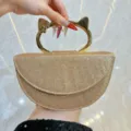 Sac de soirée pailleté doré élégant avec poignée métal d'oreilles de chat pour femme - Champagne
