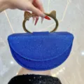 Sac de soirée pailleté bleu avec poignée chat dorée, sac bandoulière élégant pour femmes. - Bleu
