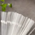 Close-up detail shot of clear plastic bendy drinking straws, perfect for cold drinks and parties. - 100 Pieces 6x210mm / Clear