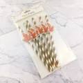 Disposable paper straws with autumn maple leaf card decoration for party drinks and celebrations. - Gold Printed Stripe With Red Maple Leaf