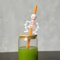 Halloween party decoration plastic straw with cute white skeleton design detail shot. - 4 Pcs White Skull Orange Straw