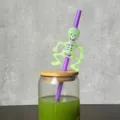 Halloween glowing green skeleton ghost straw detail close-up view for party drink decoration. - 4 Pcs Green Skull Purple Straw