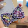 Pince à cheveux nœud en strass scintillants pour femmes, élégant accessoire de cheveux en cristal. - Violet