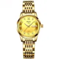 Reloj de cuarzo dorado para mujer con correa metálica, esfera redonda y visualización de fecha. - Correa de Oro Completo de 9 Cuentas Esfera Dorada