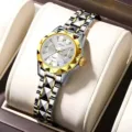 Women's fashion quartz watch with diamond-cut bezel and two-tone strap. Detail view of elegant watch. - Two Tone Gold White Dial with Gold Bezel
