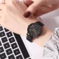 Minimalist women quartz watch with black leather strap and round dial for daily casual wear. - No Calendar Black Leather Strap Black Dial