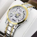 Montre bracelet quartz homme acier inoxydable bicolore cadran squelette design élégant. - Style Bracelet Bicolore Cadran Blanc