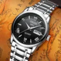 Reloj de cuarzo para hombre con correa de metal plateado y esfera negra con calendario. - Banda Plateada Esfera Negra Hombre