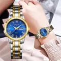 Elegant dames horloge met blauwe wijzerplaat, romeinse cijfers en tweekleurige metalen band. - Goud Zilver Blauwe Wijzerplaat