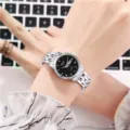 Orologio al quarzo da donna con cinturino in acciaio inossidabile argento e quadrante nero. - Regale Donne Quadrante Nero