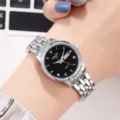 Elegante Damen Quarzarmbanduhr mit schwarzem Zifferblatt und silbernem Metallarmband. - Königlich Damen Schwarzes Zifferblatt
