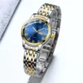 Reloj de cuarzo bicolor de acero inoxidable con esfera azul y visualización de fecha. - Mujeres-Romano Dos Tonos Oro Esfera Azul