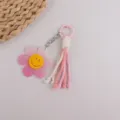 Llavero de flor estilo ins con pétalo de purpurina rosa y borla de algodón suave. - Rosa