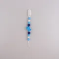 Silicone pacifier clip with cute blue dinosaur and beads, anti-drop toy strap variant blue. - Blue