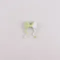 Siliconen strik kraal in lichtgroen en wit voor DIY kralenpennen en sieraden accessoires. - Verloop Groen