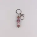Brown silicone cross beaded keychain with metal lobster clasp and shiny rhinestones. - Coffee