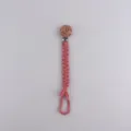 Handmade braided baby pacifier clip with cute flower beech wood and pink cotton strap. - Dusty Pink