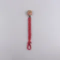 Red braided cotton baby pacifier chain with floral beech wood clip and metal clasp - Watermelon red