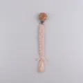 Handmade woven baby pacifier clip with floral wooden bead and soft cotton strap for infants. - Nude