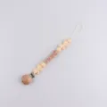 Baby pacifier clip with silicone bow wooden beads handmade soothing teething toy accessory SKU - Beige Bow