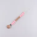 Pink silicone pacifier clip with wooden beads and cute bows, safe baby teething toy chain. - Pink Bow