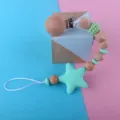 Wooden silicone baby pacifier clip teether chain, mint green star design for newborn safety. - Green