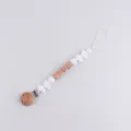 Silicone wooden baby pacifier clip, cute bow anti-drop teething toy for newborn infants. - White Yarn Ball