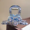 Clear plastic hair claw clip with sparkly rhinestone heart detail for elegant women hairstyles. - Blue & White