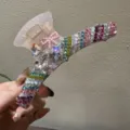 Wunderschöne Strass Haarklammer mit bunten Kristallen und Perlen Schleife für elegante Frisuren. - Rosa