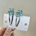 Pinces à cheveux fleurs en cristal bleu pour femmes, pinces latérales scintillantes détail. - Bleu clair