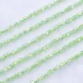 Detail van lichtgroene gefacetteerde kristallen kralen 4mm voor DIY handgemaakte sieraden. - Vruchtengroen AB (Ongeveer 100 Stuks)