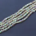 Detailopname van 4mm gefacetteerde kristal kralen met glanzende AB coating voor sieraden. - Glanzend Goud (Ongeveer 100 Stuks)