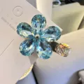 Pince à cheveux fleur en cristal bleu strass étincelant accessoire pour femmes et filles - Bleu clair