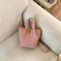 Pink leather bucket bag women's minimalist shoulder crossbody handbag with metal lock. - No Pendant / Pink