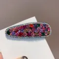 Détail d'épingle à cheveux en strass colorés étincelants avec cristaux multicolores en goutte d'eau. - Multicolore Foncé