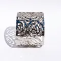 Wide silver open cuff bracelet with hollow floral pattern and textured wrinkled finish. - White Gold