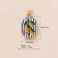 Vergulde koperen ovale hanger met een chic blauw gestreept citroen- en bloemenkunstontwerp. - Ronde Mango Hanger