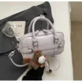 Chic purple shoulder handbag for women, trendy crossbody bag with cute pony plush charm. - With Pendant / Purple