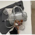 Metallic silver top handle shoulder bag with cute plush horse charm for women stylish daily. - With Pendant / Silver