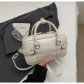Stylish white top handle handbag for women, casual commuter shoulder bag with premium texture. - No Pendant / Off White