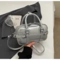 Silver metallic women handbag, stylish PU leather shoulder and crossbody bag for daily commute. - No Pendant / Silver