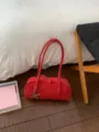 Stylish red shoulder bag with long straps and chic star charm for women commuting daily. - No Pendant / Red