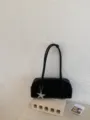 Elegant black minimalist shoulder underarm bag for women featuring trendy star pendant. - With Charm / Black