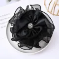 Elegant black chiffon satin flower hair accessory with sparkling rhinestone center for women. - Black